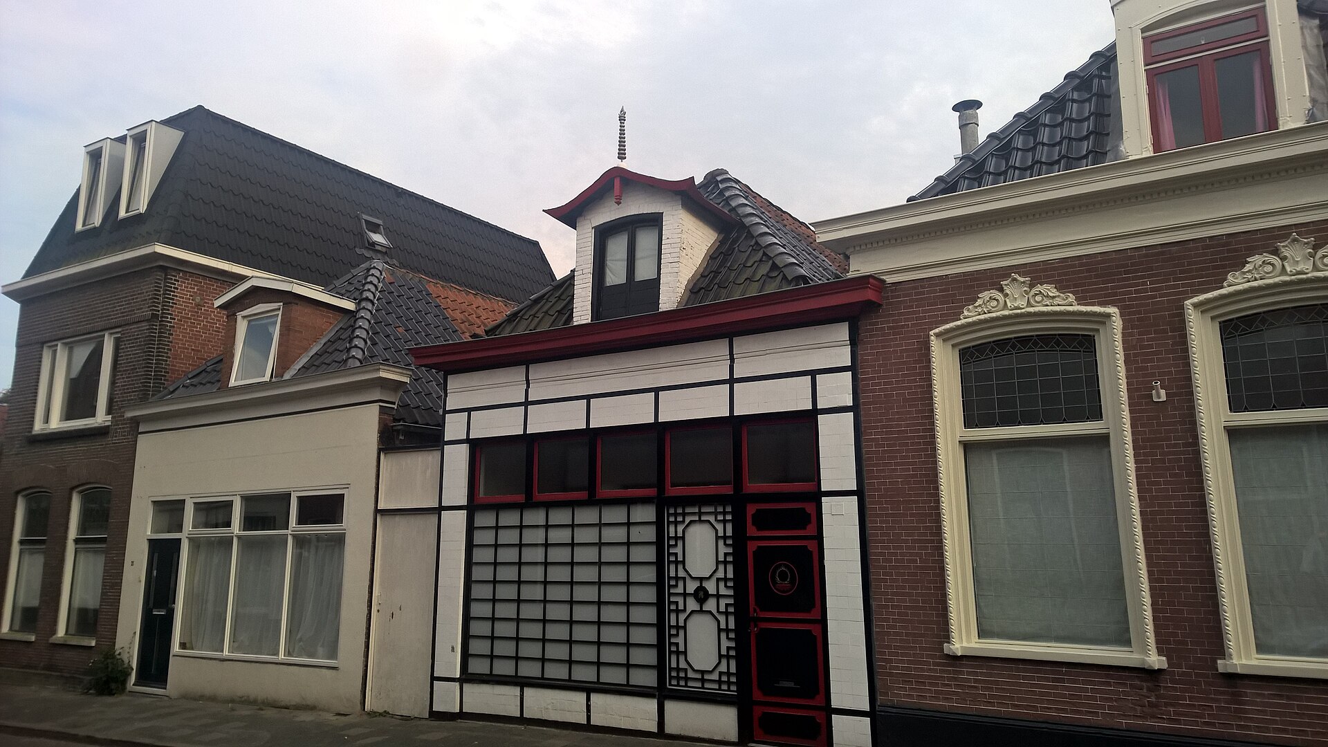 Brick homes along a residential Groningen street